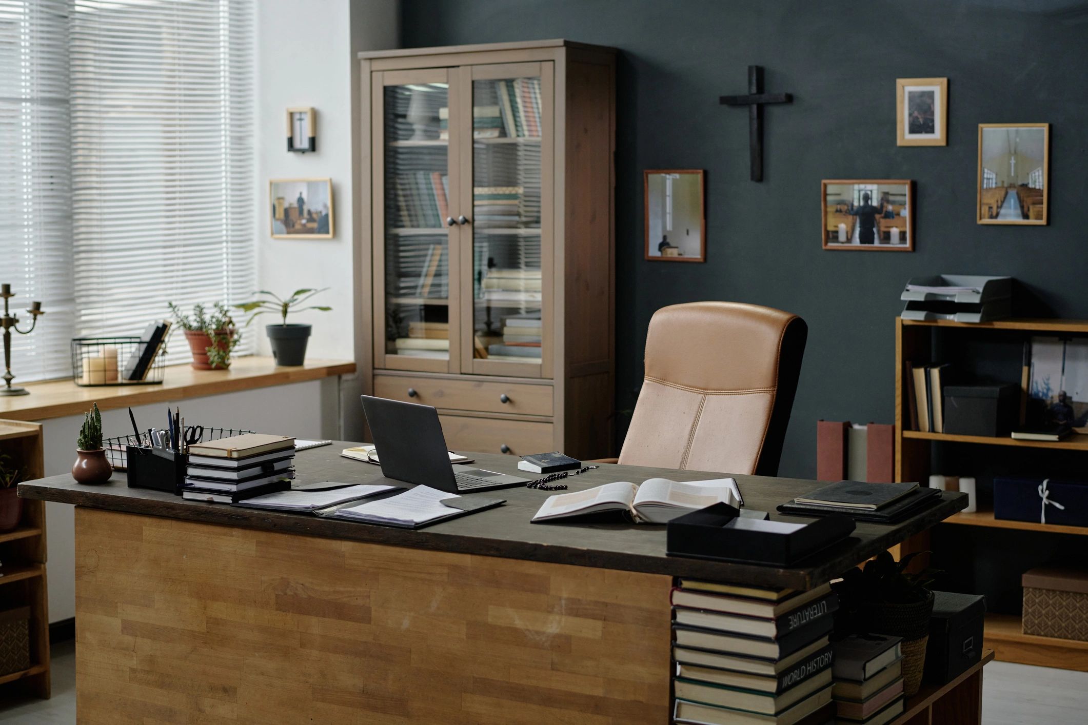 Minimal office with modern wooden furniture and shelving