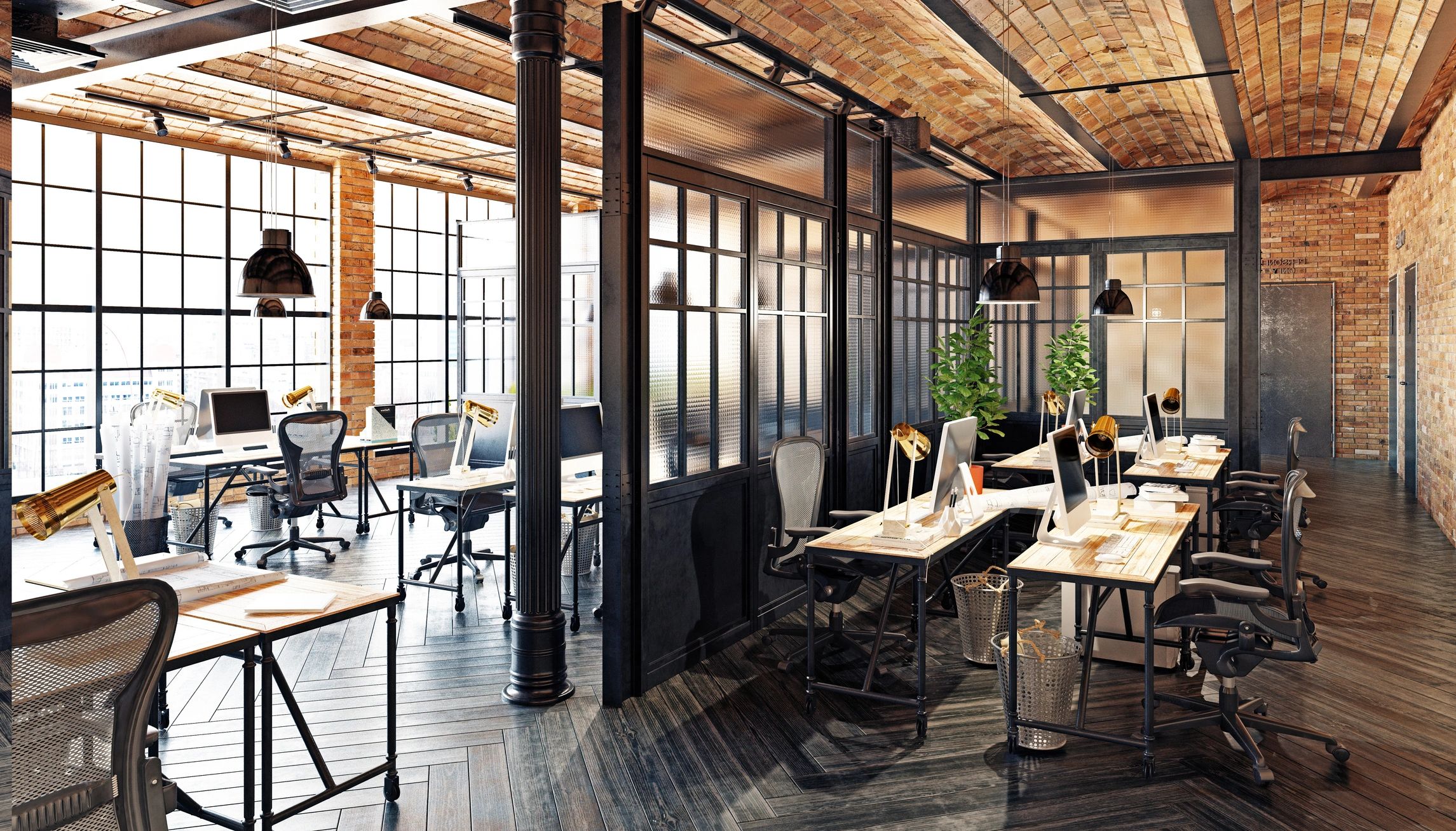 Open-plan office with wooden desks and industrial style